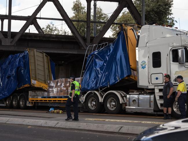 Category:News; Caption:This was the truck that got stuck under the bridge on Racecourse rd Nth Melbourne  today  13-4-14; Read the terms and conditions:YesWEBSITE READER PICTURE HWTGrant Findlay , bmmarque@bigpond.com, 0413181425,