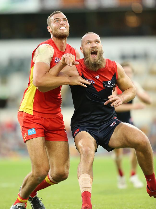 Melbourne’s Max gawn battles with the Gold Coasts Jarrod Witts in round 8 at the Gabba. Picture: Jono Searle/Getty