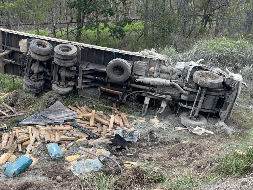 A truck driver has died following a horror rollover on the Bruce Highway at Clairview on Monday, November 27, 2023. Picture: Zoe Devenport