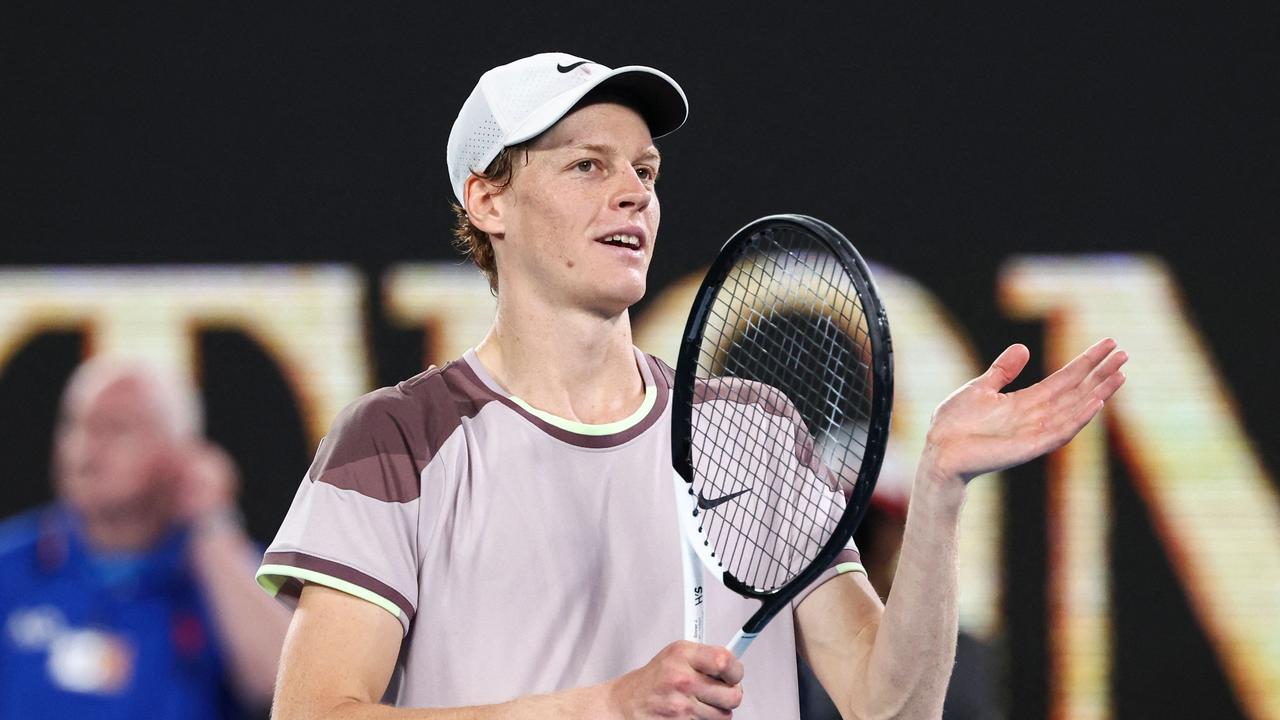 Italy's Jannik Sinner celebrates after victory against Russia's Andrey Rublev during their men's singles quarter-final match on day 10 of the Australian Open tennis tournament in Melbourne on January 24, 2024. (Photo by David GRAY / AFP) / -- IMAGE RESTRICTED TO EDITORIAL USE - STRICTLY NO COMMERCIAL USE --