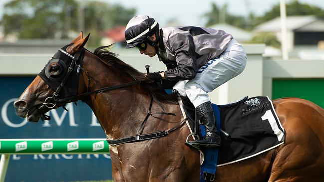 Jeff Lloyd rides Houtzen to victory in race 6, the Bribie Handicap, during Doomben Raceday at the Doomben Racecourse in Brisbane, Saturday, December 15, 2018. (AAP Image/Albert Perez) NO ARCHIVING, EDITORIAL USE ONLY