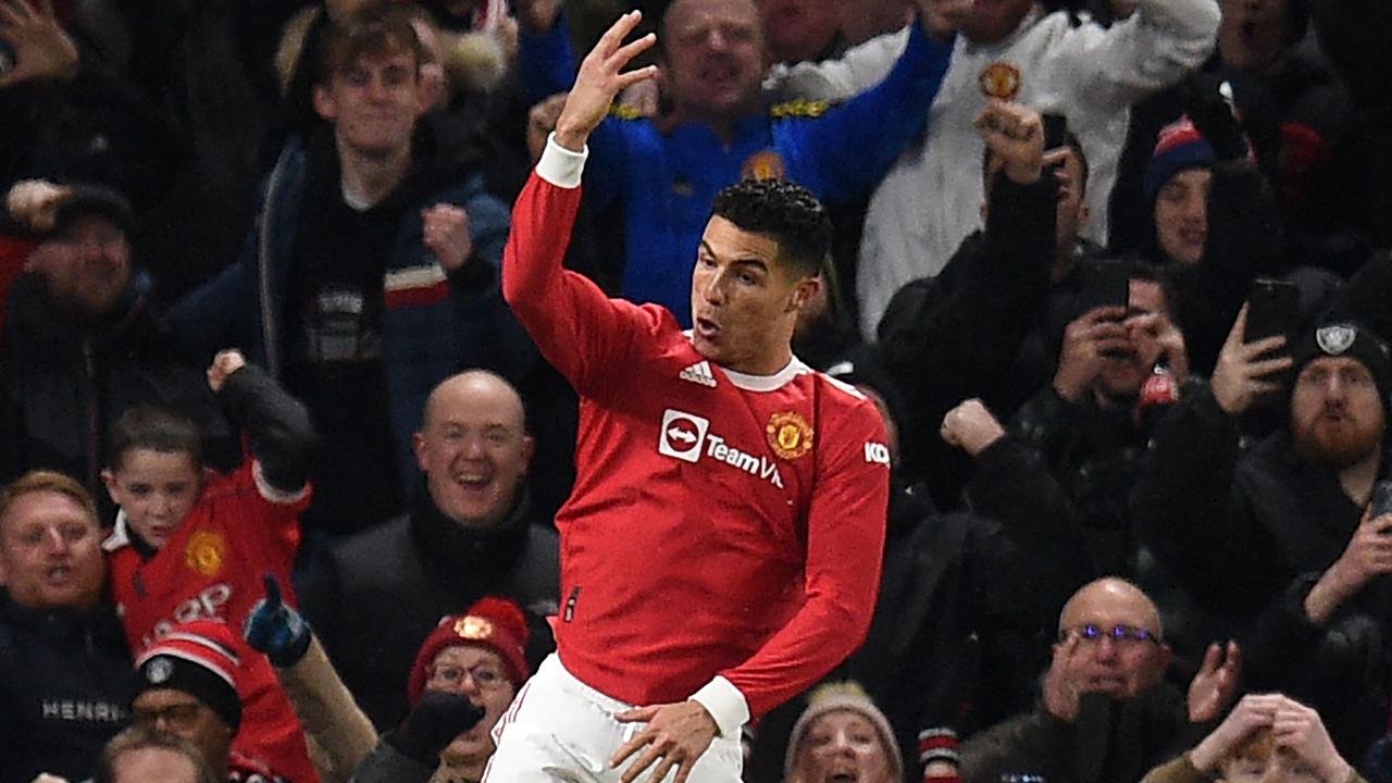 Il giocatore del Manchester United Cristiano Ronaldo festeggia.  (Foto di Olly Scarf/AFP)