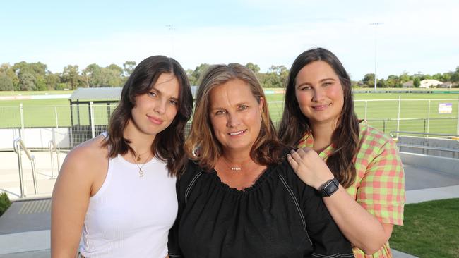 Anita Frawley, with daughters Danielle and Chelsea, is backing more research into CTE. Picture: Alex Coppel