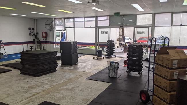 Equipment being removed from F45 Devonport on Tuesday afternoon. Picture: Alex Treacy