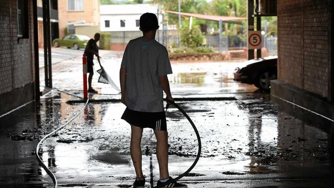 FLOOD CLEANUP: Locals were in town to cleanup and get things back to normal in the CBD. Picture: Marc Stapelberg