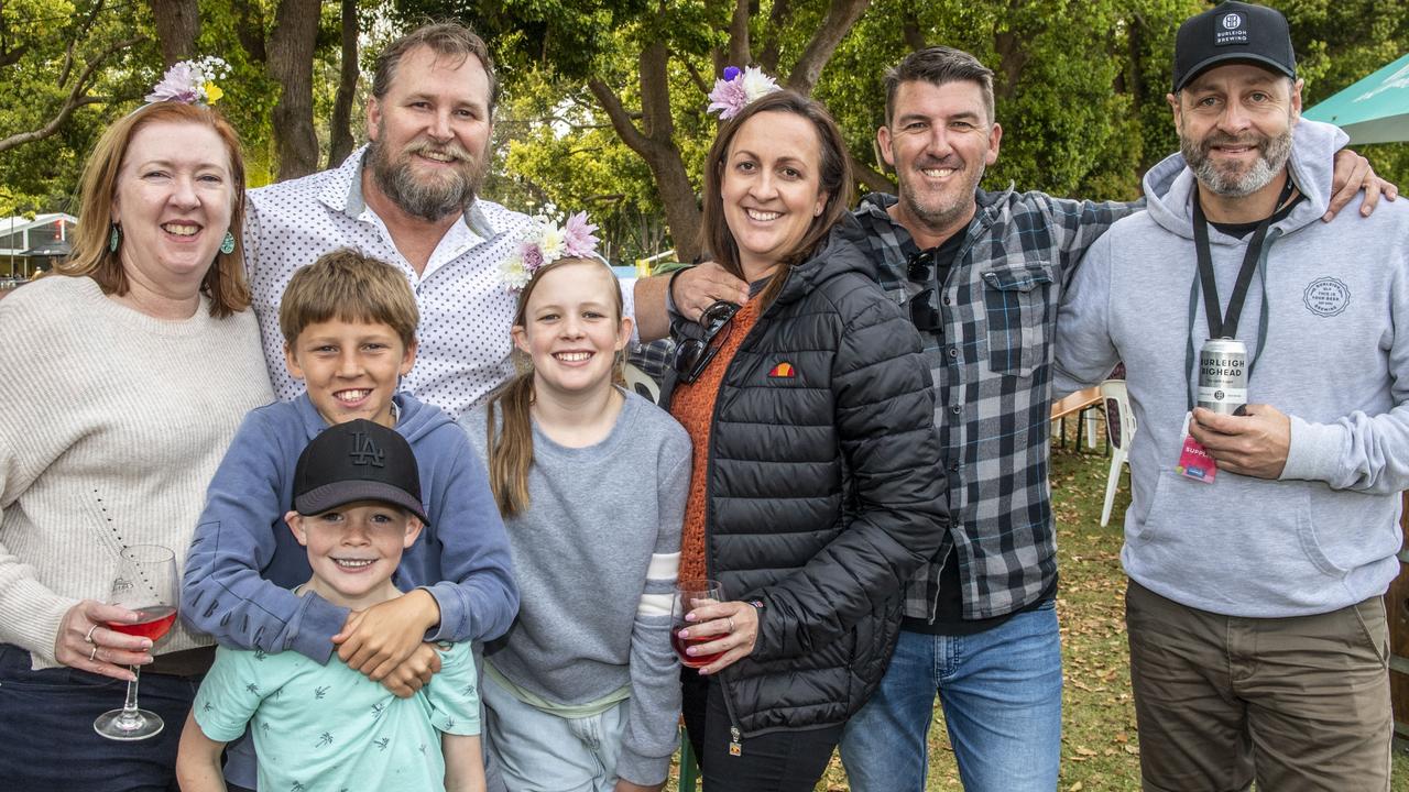 (from left) Angela O'Shea, Paul Barber, Austin Foat, Cooper Ipson, Ella Ipson, Maria Ipson, Simon Foat and Nick Lowien. Festival of Food and Wine, Queens Park, Toowoomba Carnival of Flowers. Sunday, September 11, 2022. Picture: Nev Madsen.