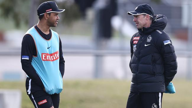 Neville Jetta talks to Collingwood coach Craig Macrae. Picture: Michael Klein