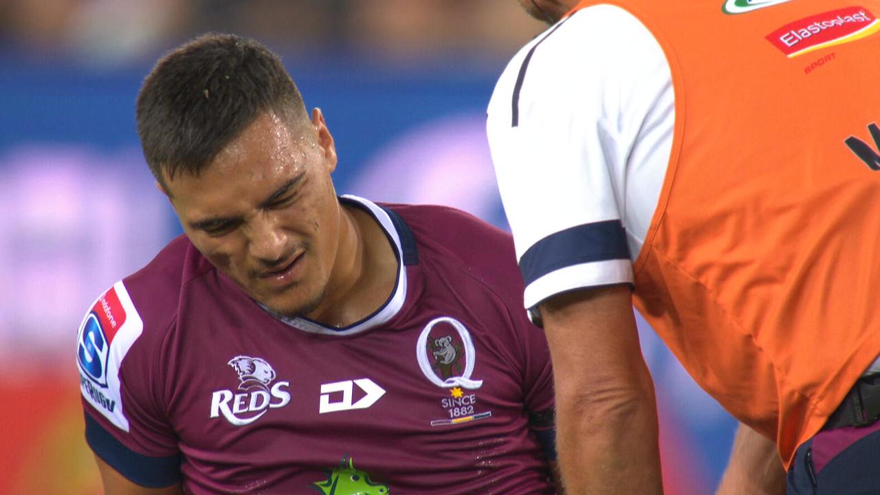 Jordan Petaia grimaces after injurying his foot against the Crusaders.