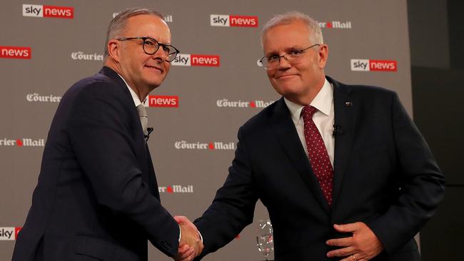 Anthony Albanese and Scott Morrison ScottMorrison shake hands before the first leaders' debate. Picture: Getty Images.