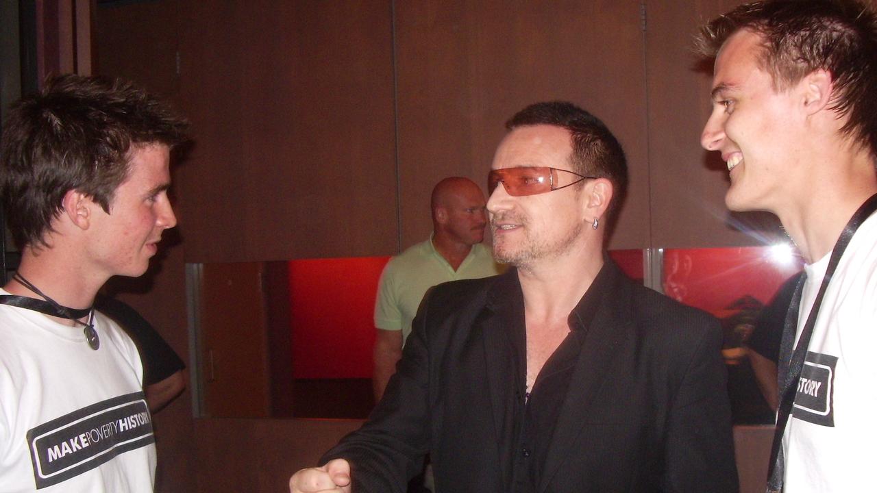 Dan with Bono at the Make Poverty History event. Picture: Supplied.