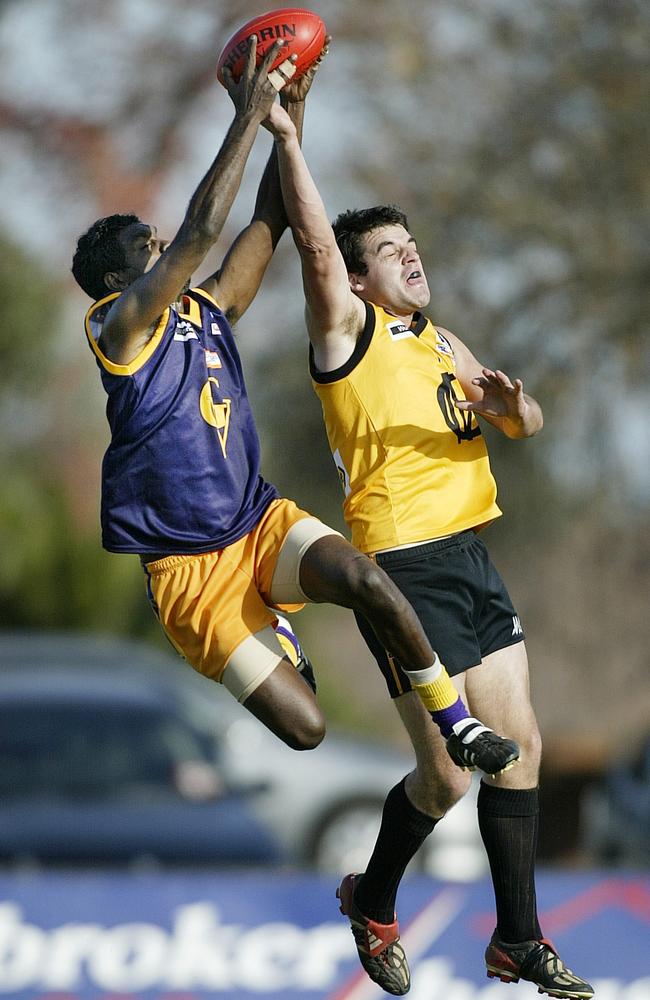 Roberts flies high for a mark while playing for the GVFL.