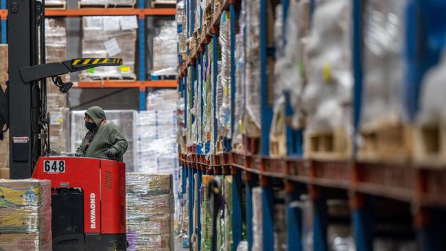 An employee organises produce at the Houston Food Bank facility on February 8, 2022 in Houston, Texas. Picture: Getty