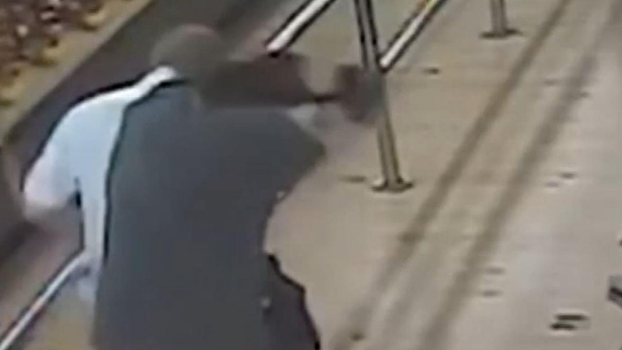 The worker was pushed against railing before the suspect walked off. Picture: 7NEWS