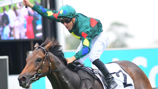 Alligator Blood crosses the winning post at the Magic Millions Guineas. Picture: Trackside Photography