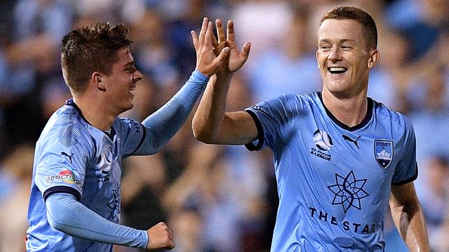 Sydney youngster Cameron Devlin (left) celebrates scoring with teammate Brandon O’Neill. Picture: AAP 