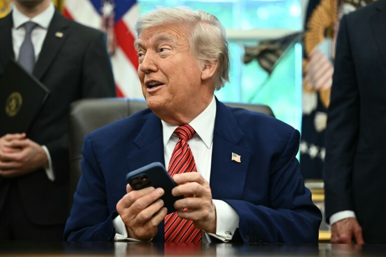 Trump fires new tariff threats at Apple and EU