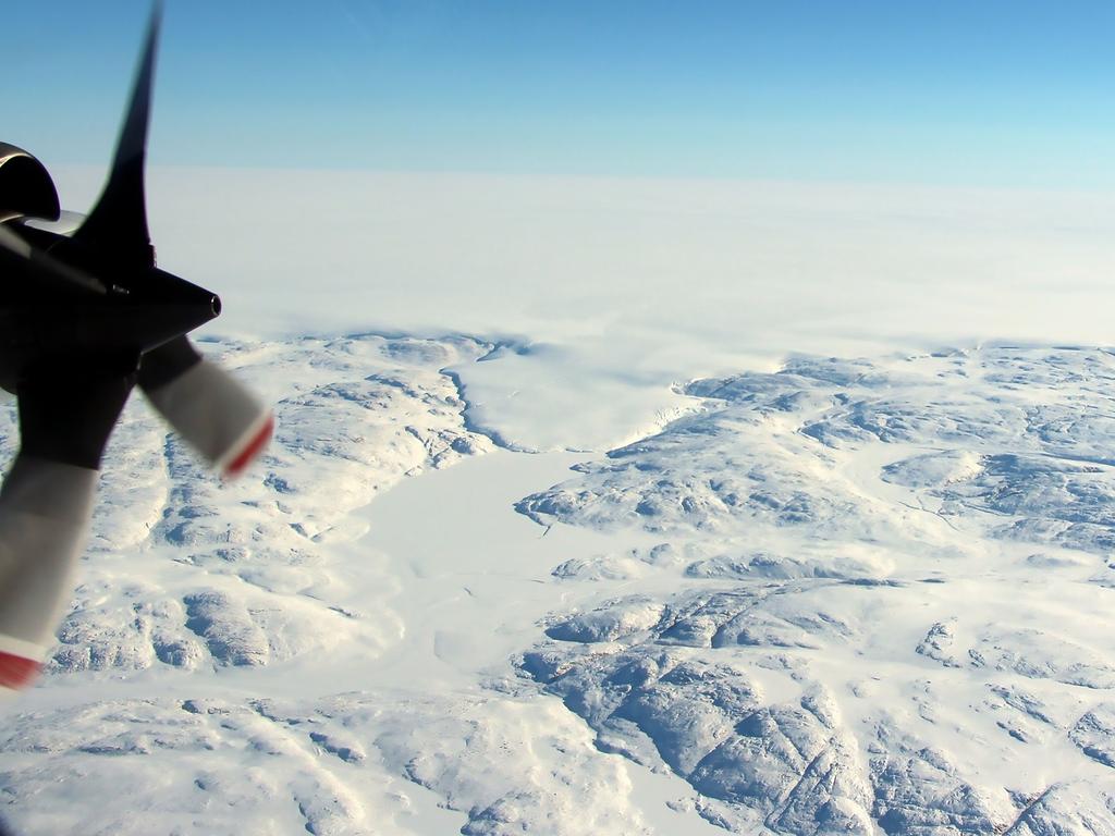 The Hiawatha impact crater covered by the Greenland Ice Sheet and a tongue of ice that breaches the crater’s rim. Picture: NASA