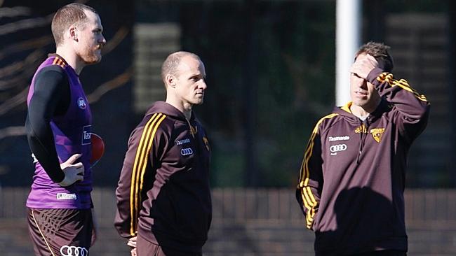 Jarryd Roughead (left) with Hawks fitness boss Andrew Russell (middle) and coach Alastair Clarkson. Picture: Michael Klein