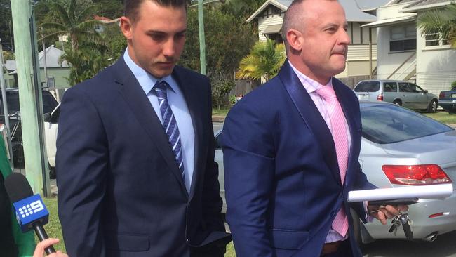 Titan Karl Lawton walks out of Tweed Heads Local Court with his lawyer Campbell MacCallum.