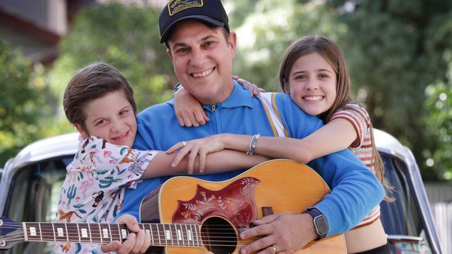 Musician David Cosma, with son Charlie, 8, and Georgie, 11, is taking a new prostate cancer drug that has just been approved in Australia. Picture: David Caird