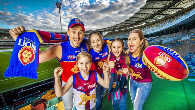 Lions fans Chris and Yvette La Burniy with their children Henry, 8, Eva, 13 and Ruby, 11 would love to see the AFL Grand Final played at the GABBA. Picture: Nigel Hallett