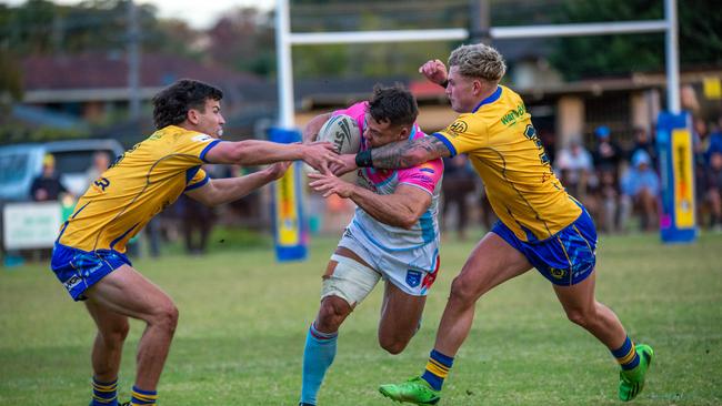 Warilla-Lake South Vs Milton-Ulladulla. Mitch Simmington splitting the defence. Picture: Thomas Lisson