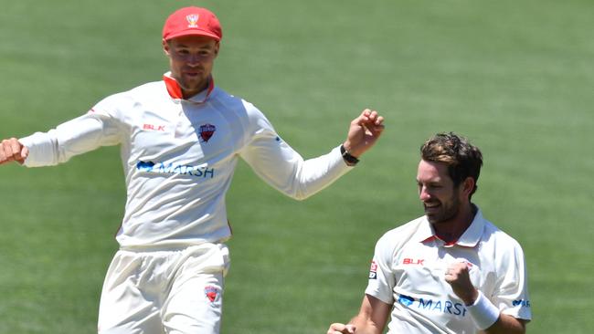 Luke Robins (L) celebrates with Chadd Sayers. Picture: AAP/David Mariuz