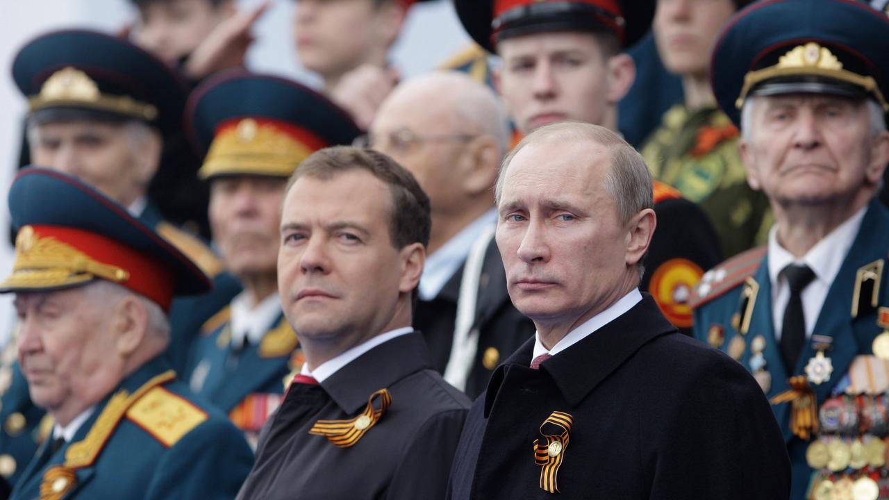 Former Russian President Dmitry Medvedev and current President Vladimir Putin. Picture: AFP PHOTO / RIA NOVOSTI / POOL / ALEXEY DRUZHININ
