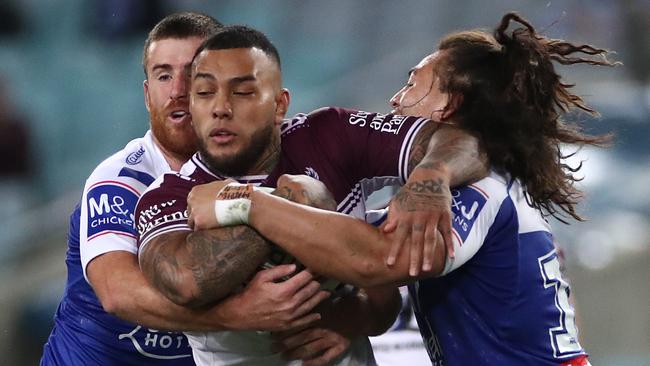 SYDNEY, AUSTRALIA – SEPTEMBER 11: Addin Fonua-Blake of the Sea Eagles is tackled during the round 18 NRL match between the Canterbury Bulldogs and the Manly Sea Eagles at ANZ Stadium on September 11, 2020 in Sydney, Australia. (Photo by Cameron Spencer/Getty Images)