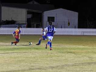 FOOTWORK: KSS Jets player Jordan Dowden beats the Sunbury defender in Saturday night's loss in Maryborough. Picture: Brendan Bowers