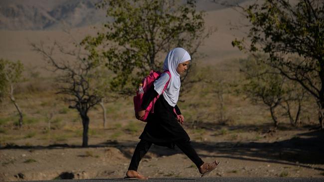 An Afghan girl walks to school on the outskirts of Herat. Picture: AFP