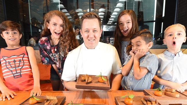 Chef Ashley Palmer-Watts serves Zach, Manni, Lucy, Reid and Levi (left to right). Picture: Tony Gough