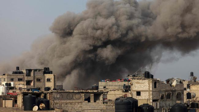 Smoke billows following Israeli bombardment in Rafah, in the southern Gaza Strip, on March 27, 2024, amid the ongoing conflict between Israel and the Palestinian militant group Hamas. (Photo by Mohammed ABED / AFP)