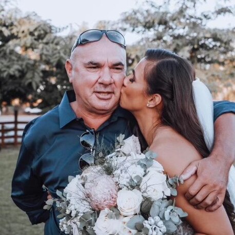 Robert “Massy” Smith, 51, was rushed to Townsville Hospital with a fractured skull after a "freak accident" on July 21. He's pictured at his son Robbie’s wedding earlier this year