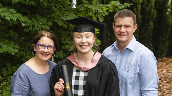 Master of Learning and Teaching graduate Rebecca Peake with parents Kathy and Allan Peake at the UniSQ graduation ceremony at Empire Theatres, Tuesday, December 13, 2022. Picture: Kevin Farmer