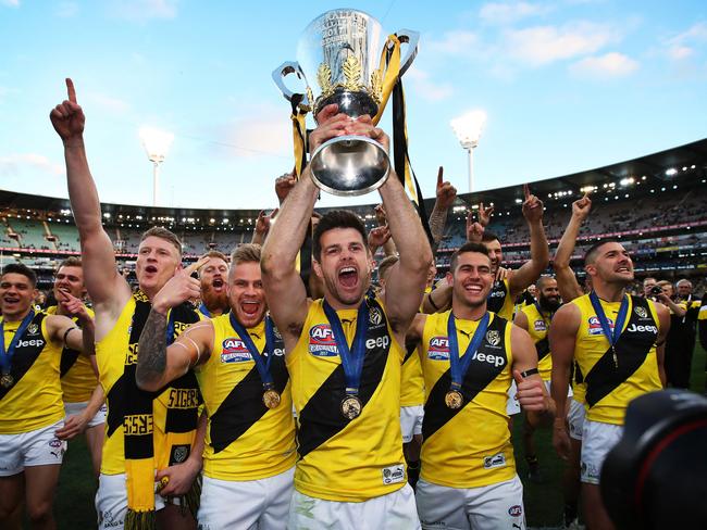 Tiger's captain Trent Cotchin celebrates with the Premiership Cup after Richmond defeated the Adelaide Crows in the 2017 AFL Grand Final at the MCG. picture. Phil Hillyard