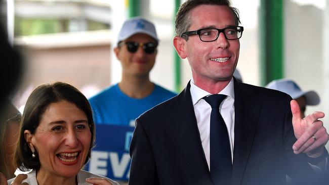 NSW treasurer Dominic Perrottet (right) said Berejiklian’s victory would “inspire” women and young girls. Picture: AAP/Dean Lewins