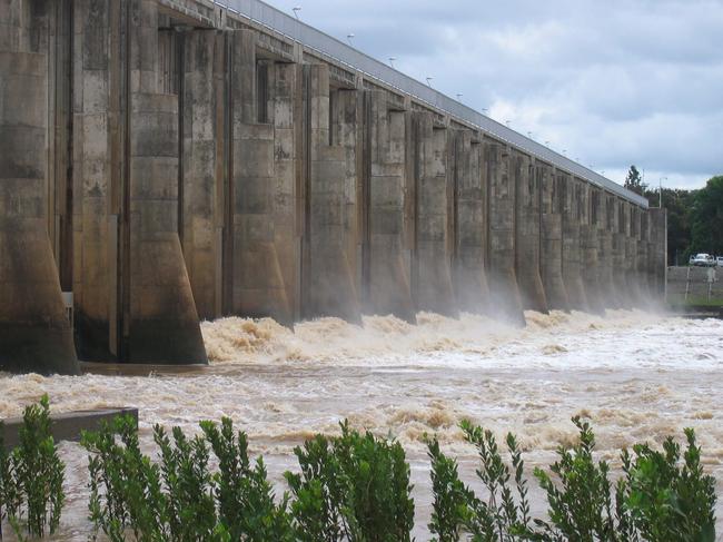 A minor river flow through the Fitzroy River Barrage creates a perfect picture.