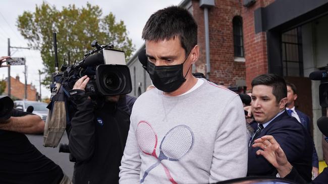 Richard Pusey is taken away from his Fitzroy property by police in Melbourne on April 23. Picture: AAP Image/Michael Dodge