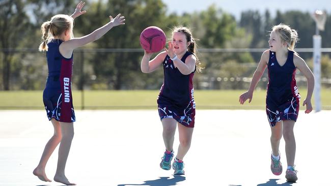 Mia, Abbey and Chloe utilise the new Macedon Ranges Netball Complex. Picture: David Smith