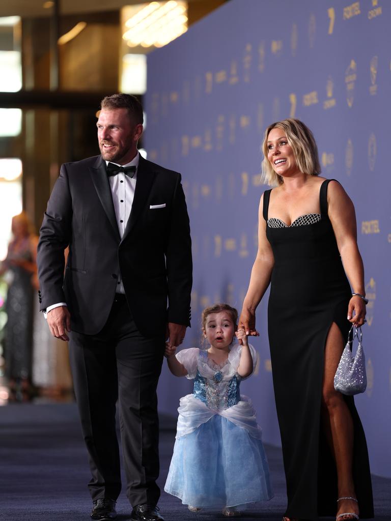 Aaron Finch and Amy Finch arrive with their daughter Esther ahead of the 2024 Cricket Australia Awards at Crown Palladium. Photo by Jonathan DiMaggio/Getty Images for Cricket Australia)