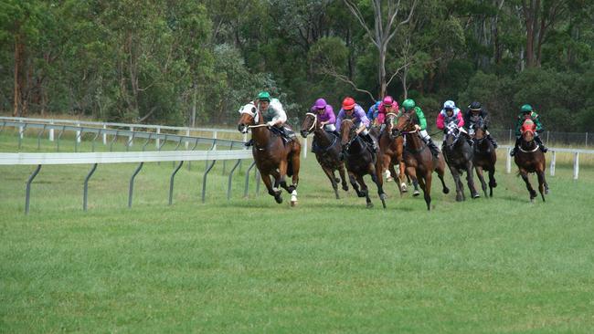 AND THEIR RACING: There will be plenty of action on the track at the the Nanango Race Club this weekend for the club's Christmas meeting.