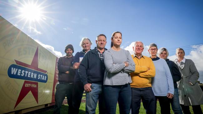 Dairy farmers Robert Campbell, Bernie Free and Ben Bennett with Corangamite Shire mayor Kate Makin, Progressing Cobden members Milton Parlour and Barbara Cowley, dairy farmer Jo Harper and Corangamite Shire councillor Jo Beard. Picture: Nicole Cleary