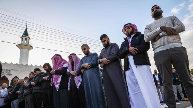 Worshippers participate in Eid al-Fitr prayers, marking the end of the holy month of Ramadan, outside the Lakemba Mosque in Sydney on April 10. Picture: David Gray/AFP