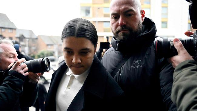 Chelsea's Australian striker Sam Kerr (C) arrives at Kingston Crown Court in south London on February 10, 2025. Prosecutors in the trial of Kerr, who called a police officer "stupid and white", have asked the jury if perceptions would be different had she said "stupid and black". The Australia captain is on trial charged with causing racially aggravated harassment, which she denies, to police constable Stephen Lovell during an incident in southwest London in the early hours of January 30, 2023. (Photo by Ben STANSALL / AFP)