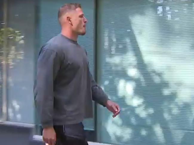 Burgess arriving at Mascot Police Station on March 21 prior to his arrest. Picture: Nine News