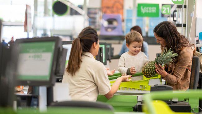 Do you let your child help with scanning and paying for items at the supermarket checkout? Image: iStock