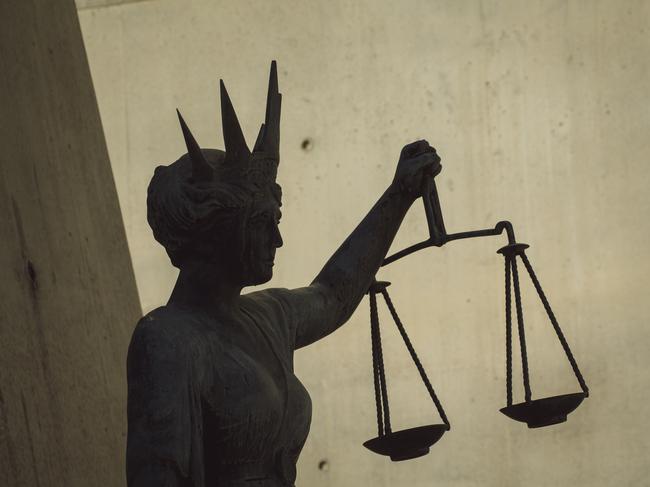 BRISBANE , AUSTRALIA - NewsWire Photos - BRISBANE , JUNE 24 2024: Generic photo of the scales of justice stature outside Brisbane Supreme Court in the Brisbane CBD. Picture: NewsWire / Glenn Campbell