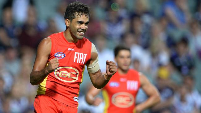 Suns young gun Jack Martin celebrates one of his four goals. Picture: Daniel Wilkins