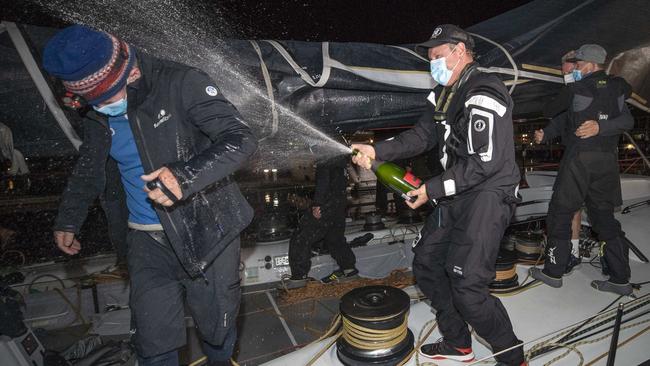 Masked celebrations after Black Jack wins the race. Pic: Chris Kidd